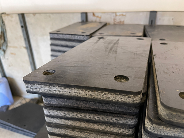 Cut out rubber pieces by Burton Rubber on a Swift-Jet Waterjet cutting table
