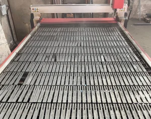 Schlosserei Bierbaumer's Swift-Cut Pro Table showing cut metal pieces
