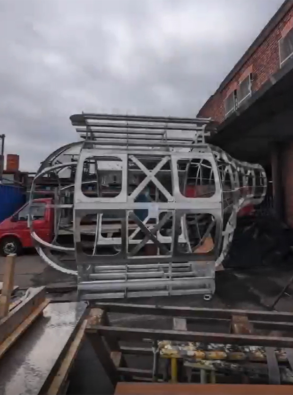 TOR Design and Fabrication - Image of submarine sculpture made from metal pieces cut on Swift-Cut Pro being put together