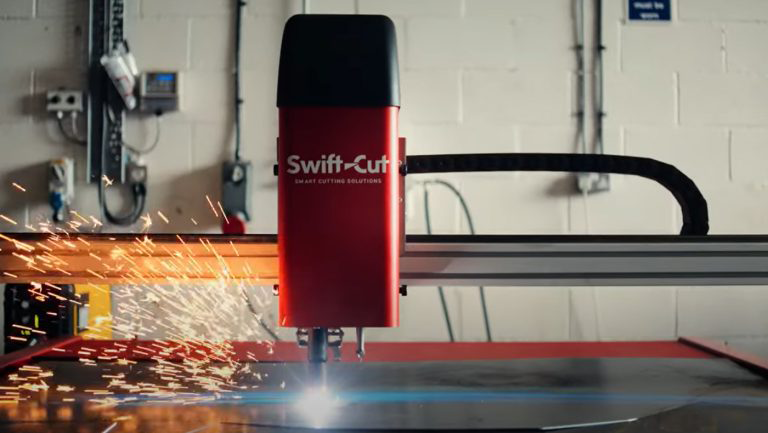 Swift-Cut Pro Plasma Cutting Table at Swift-Cut Headquarters Demo Suite being used to cut pieces for 10ft cat sculpture by Nate's Forge