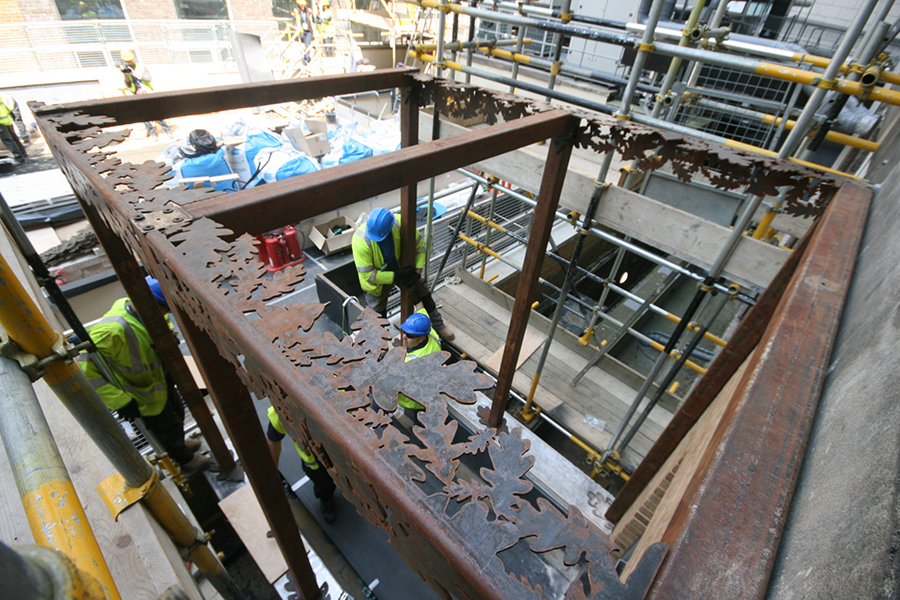 DIY SOS The Big Build team constructing beautiful garden pergola on a roof space at the Great Ormond Street Hospital cut by Nigel Ferguson Fabrications on the Swift-Cut Pro CNC plasma cutting machine