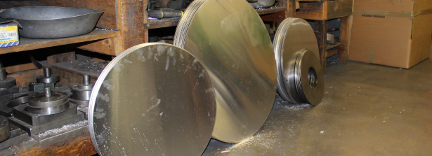 Glanville Metal Spinning - various cut out metal circular pieces