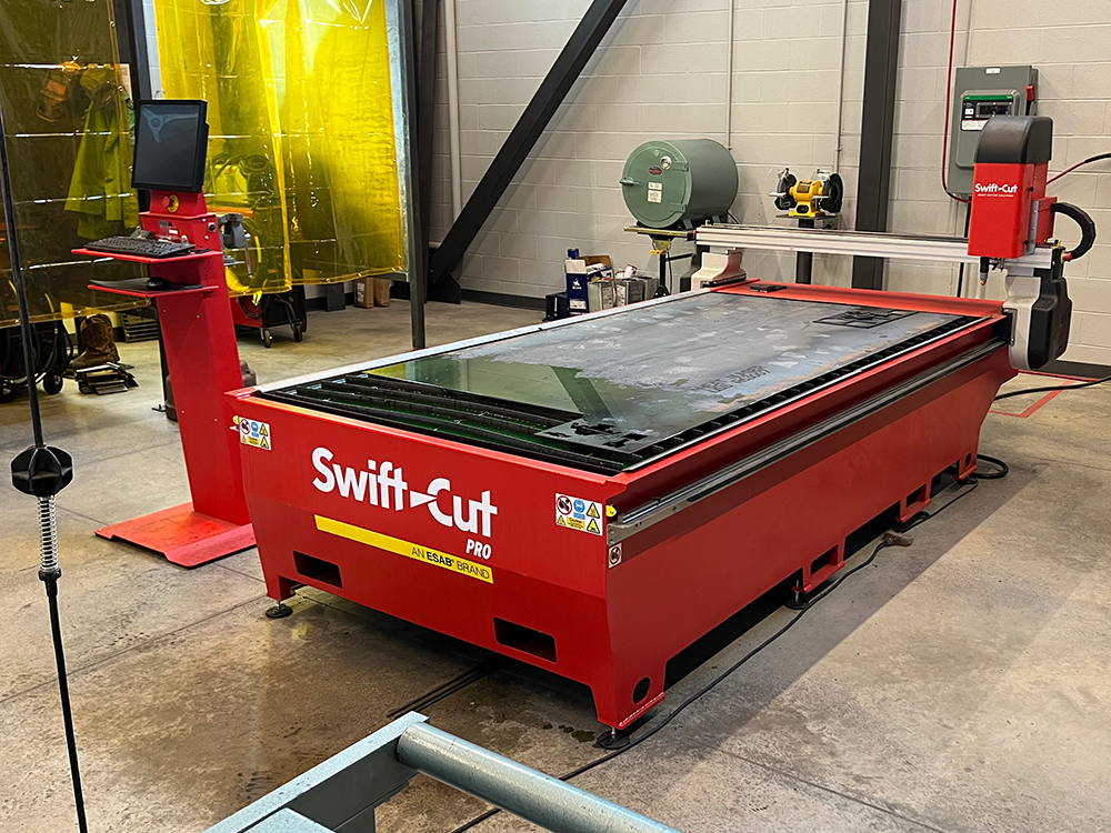 Swift-Cut & Lampton Welding Supply introduce new Swift-Cut Pro plasma cutting machine solution to Cloud County Community College - image of table in workshop