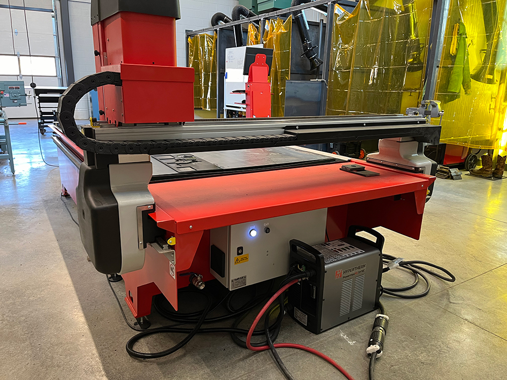 Swift-Cut & Lampton Welding Supply introduce new Swift-Cut Pro plasma cutting machine solution to Cloud County Community College - image of table in workshop