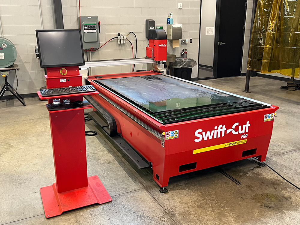 Swift-Cut & Lampton Welding Supply introduce new Swift-Cut Pro plasma cutting machine solution to Cloud County Community College - image of table in workshop