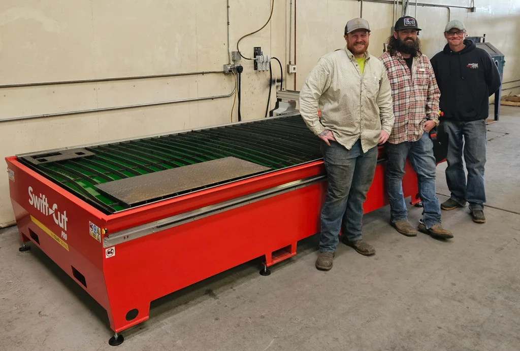 Method Flow Products boosts production - Method Flow Metal Cutters standing in front of their excellent new Swift-Cut Pro 510