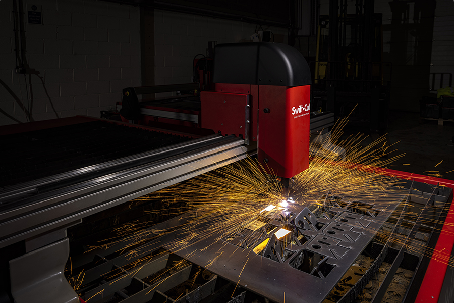 Swift-Cut Pro CNC Plasma Cutting Table in action close up of plasma cutting head with sparks