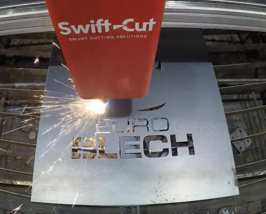 Swift-Cut Pro CNC Plasma cutting table cutting the EuroBLECH logo into sheet metal